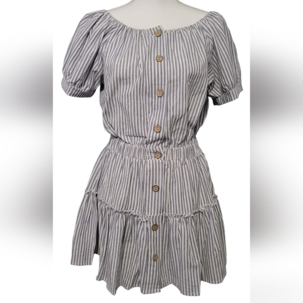 Blue and white dress with puff sleeves